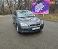 Серый Форд Фокус, объемом двигателя 1.6 л и пробегом 200 тыс. км за 2500 $, фото 1 на Automoto.ua