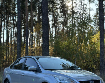 Серый Форд Фокус, объемом двигателя 1.6 л и пробегом 117 тыс. км за 7500 $, фото 4 на Automoto.ua