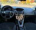 Сірий Форд Фокус, об'ємом двигуна 1.6 л та пробігом 235 тис. км за 6399 $, фото 4 на Automoto.ua