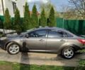 Сірий Форд Фокус, об'ємом двигуна 2 л та пробігом 251 тис. км за 6800 $, фото 1 на Automoto.ua