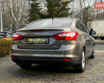 Серый Форд Фокус, объемом двигателя 1 л и пробегом 117 тыс. км за 6800 $, фото 6 на Automoto.ua