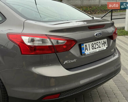 Серый Форд Фокус, объемом двигателя 1 л и пробегом 145 тыс. км за 6350 $, фото 26 на Automoto.ua