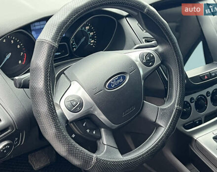 Сірий Форд Фокус, об'ємом двигуна 2 л та пробігом 234 тис. км за 6600 $, фото 26 на Automoto.ua