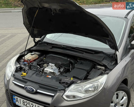 Серый Форд Фокус, объемом двигателя 1 л и пробегом 145 тыс. км за 6350 $, фото 30 на Automoto.ua