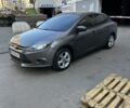 Сірий Форд Фокус, об'ємом двигуна 2 л та пробігом 230 тис. км за 6998 $, фото 1 на Automoto.ua