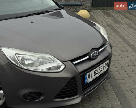 Серый Форд Фокус, объемом двигателя 1 л и пробегом 145 тыс. км за 6350 $, фото 25 на Automoto.ua