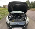 Форд Фокус 2015 у Буче на Automoto.ua Сірий Форд Фокус, об'ємом двигуна 2 л та пробігом 175 тис. км за 7500 $, фото 36 на Automoto.ua