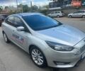 Сірий Форд Фокус, об'ємом двигуна 1.5 л та пробігом 214 тис. км за 10500 $, фото 1 на Automoto.ua