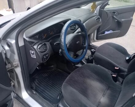 Серый Форд Фокус, объемом двигателя 1.8 л и пробегом 398 тыс. км за 1050 $, фото 5 на Automoto.ua