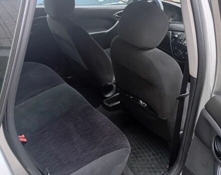 Серый Форд Фокус, объемом двигателя 1.8 л и пробегом 398 тыс. км за 1050 $, фото 12 на Automoto.ua