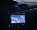 Сірий Форд Фокус, об'ємом двигуна 1.8 л та пробігом 237 тис. км за 2006 $, фото 7 на Automoto.ua