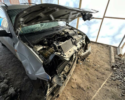 Серый Форд Фокус, объемом двигателя 1.8 л и пробегом 300 тыс. км за 1300 $, фото 14 на Automoto.ua