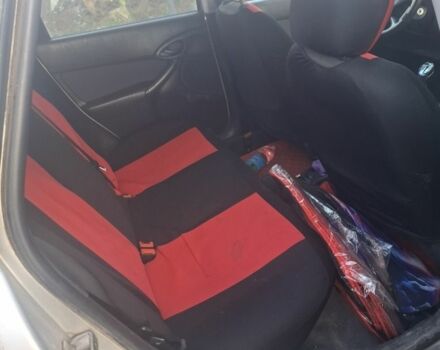 Сірий Форд Фокус, об'ємом двигуна 1.8 л та пробігом 225 тис. км за 2601 $, фото 4 на Automoto.ua