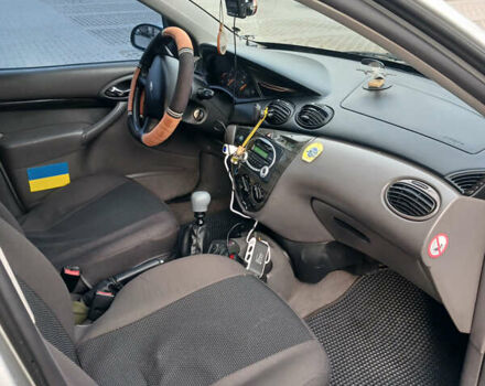 Серый Форд Фокус, объемом двигателя 1.8 л и пробегом 190 тыс. км за 3500 $, фото 4 на Automoto.ua