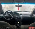 Серый Форд Фокус, объемом двигателя 1.8 л и пробегом 200 тыс. км за 1750 $, фото 9 на Automoto.ua