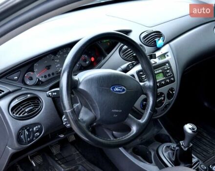 Серый Форд Фокус, объемом двигателя 1.8 л и пробегом 150 тыс. км за 3600 $, фото 16 на Automoto.ua