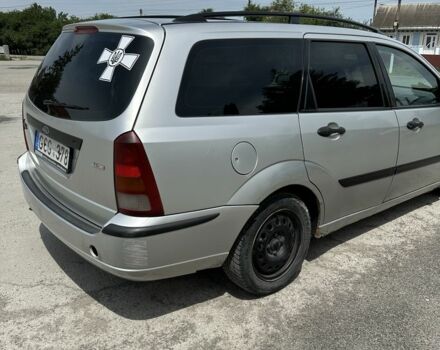 Серый Форд Фокус, объемом двигателя 1.8 л и пробегом 327 тыс. км за 1309 $, фото 2 на Automoto.ua