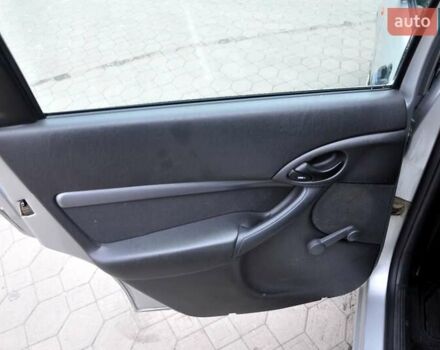 Серый Форд Фокус, объемом двигателя 1.8 л и пробегом 150 тыс. км за 3600 $, фото 18 на Automoto.ua