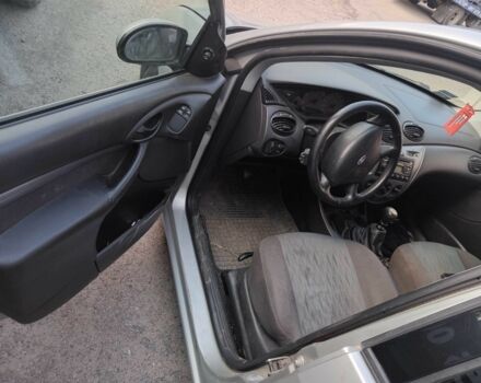 Серый Форд Фокус, объемом двигателя 1.8 л и пробегом 300 тыс. км за 1200 $, фото 5 на Automoto.ua