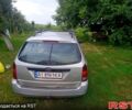 Серый Форд Фокус, объемом двигателя 1.8 л и пробегом 239 тыс. км за 1000 $, фото 6 на Automoto.ua
