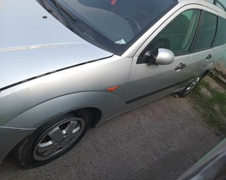 Серый Форд Фокус, объемом двигателя 1.8 л и пробегом 300 тыс. км за 1200 $, фото 1 на Automoto.ua