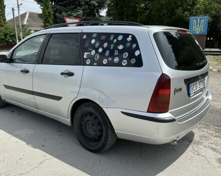 Серый Форд Фокус, объемом двигателя 1.8 л и пробегом 327 тыс. км за 1309 $, фото 4 на Automoto.ua