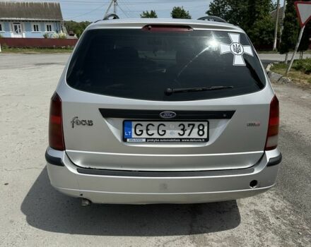 Серый Форд Фокус, объемом двигателя 1.8 л и пробегом 327 тыс. км за 1309 $, фото 5 на Automoto.ua