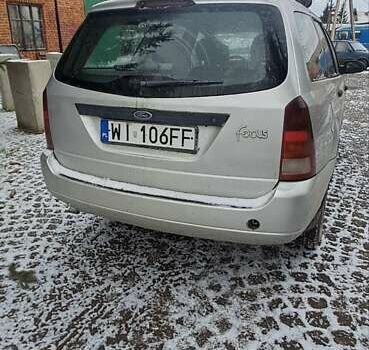 Серый Форд Фокус, объемом двигателя 1.8 л и пробегом 240 тыс. км за 1350 $, фото 2 на Automoto.ua