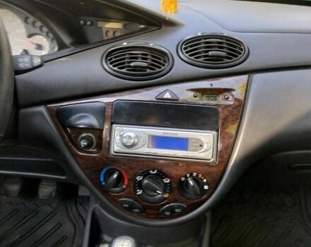 Серый Форд Фокус, объемом двигателя 1.8 л и пробегом 245 тыс. км за 4500 $, фото 22 на Automoto.ua