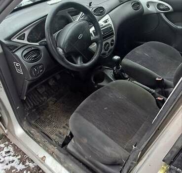 Серый Форд Фокус, объемом двигателя 1.8 л и пробегом 240 тыс. км за 1350 $, фото 5 на Automoto.ua