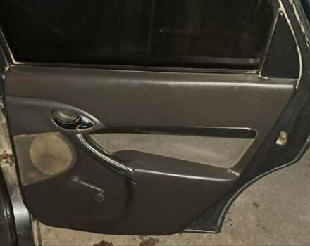 Серый Форд Фокус, объемом двигателя 1.8 л и пробегом 336 тыс. км за 3950 $, фото 1 на Automoto.ua