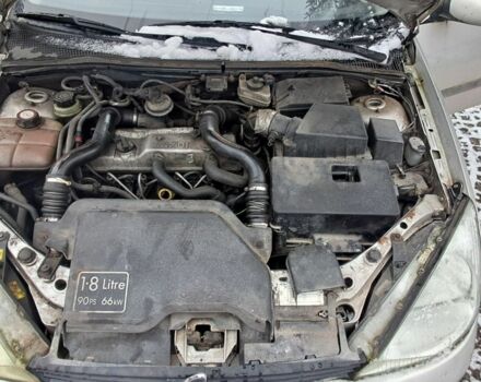 Серый Форд Фокус, объемом двигателя 1.8 л и пробегом 240 тыс. км за 1350 $, фото 6 на Automoto.ua