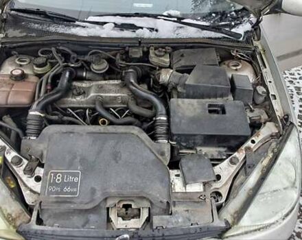 Серый Форд Фокус, объемом двигателя 1.8 л и пробегом 240 тыс. км за 1350 $, фото 6 на Automoto.ua