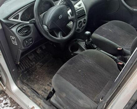 Серый Форд Фокус, объемом двигателя 1.8 л и пробегом 240 тыс. км за 1350 $, фото 5 на Automoto.ua