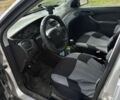 Сірий Форд Фокус, об'ємом двигуна 1.8 л та пробігом 337 тис. км за 2000 $, фото 6 на Automoto.ua