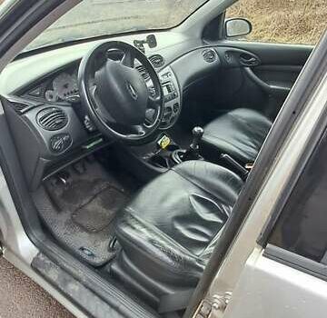 Серый Форд Фокус, объемом двигателя 1.6 л и пробегом 251 тыс. км за 3950 $, фото 7 на Automoto.ua