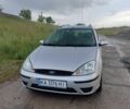 Серый Форд Фокус, объемом двигателя 1.8 л и пробегом 312 тыс. км за 3600 $, фото 1 на Automoto.ua