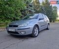 Серый Форд Фокус, объемом двигателя 1.8 л и пробегом 252 тыс. км за 3450 $, фото 1 на Automoto.ua