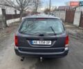Серый Форд Фокус, объемом двигателя 1.8 л и пробегом 329 тыс. км за 3500 $, фото 12 на Automoto.ua