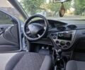 Сірий Форд Фокус, об'ємом двигуна 1.8 л та пробігом 252 тис. км за 3484 $, фото 5 на Automoto.ua