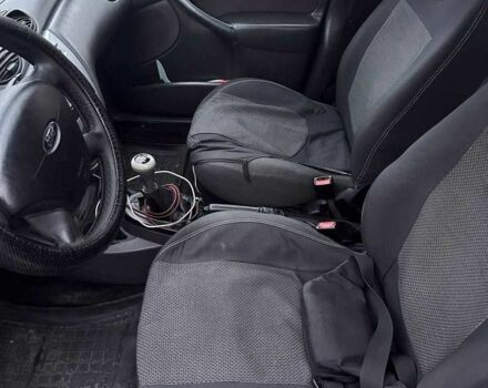 Серый Форд Фокус, объемом двигателя 1.8 л и пробегом 329 тыс. км за 3400 $, фото 7 на Automoto.ua