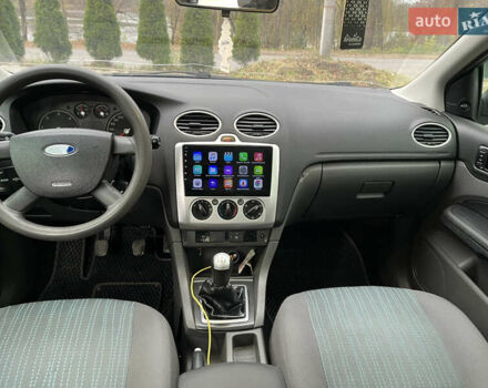 Сірий Форд Фокус, об'ємом двигуна 1.56 л та пробігом 319 тис. км за 3650 $, фото 31 на Automoto.ua