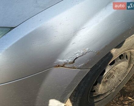 Серый Форд Фокус, объемом двигателя 1.56 л и пробегом 300 тыс. км за 3200 $, фото 2 на Automoto.ua