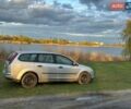 Серый Форд Фокус, объемом двигателя 1.6 л и пробегом 350 тыс. км за 5100 $, фото 1 на Automoto.ua