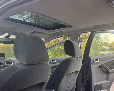 Серый Форд Фокус, объемом двигателя 1.6 л и пробегом 312 тыс. км за 4950 $, фото 6 на Automoto.ua