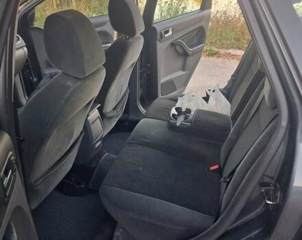 Серый Форд Фокус, объемом двигателя 1.6 л и пробегом 312 тыс. км за 4950 $, фото 8 на Automoto.ua