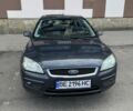 Сірий Форд Фокус, об'ємом двигуна 1.6 л та пробігом 256 тис. км за 4999 $, фото 1 на Automoto.ua