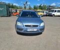 Серый Форд Фокус, объемом двигателя 1.6 л и пробегом 370 тыс. км за 4300 $, фото 1 на Automoto.ua