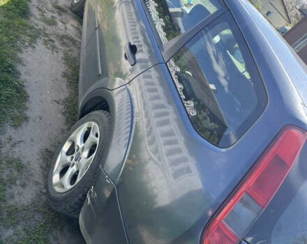 Серый Форд Фокус, объемом двигателя 1.6 л и пробегом 370 тыс. км за 4250 $, фото 3 на Automoto.ua