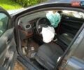 Сірий Форд Фокус, об'ємом двигуна 1.6 л та пробігом 259 тис. км за 1850 $, фото 7 на Automoto.ua
